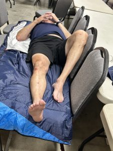One exhausted biker taking a well earned rest.
